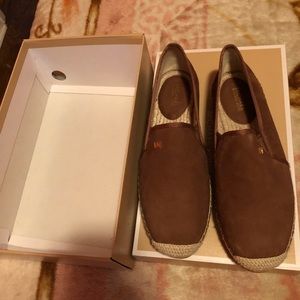 A pair of Michael Kors shoes